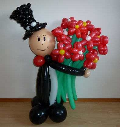 Mann mit Blumenstrauss als Dankeschön